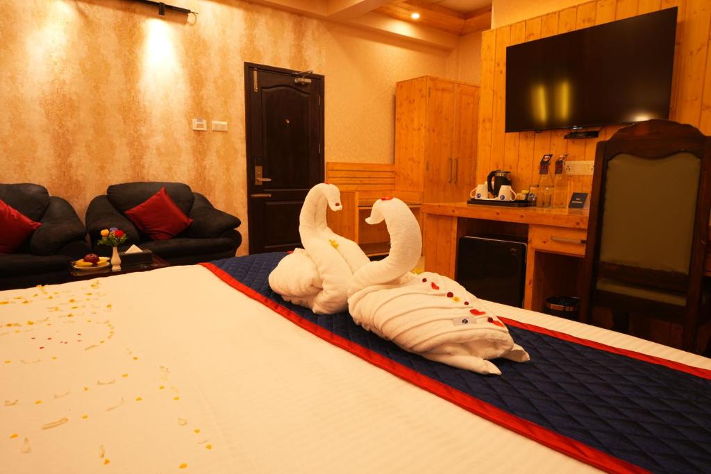 Postel nebo postele na pokoji v ubytování Zip By Spree Hotels Bella Heights Mcleodganj