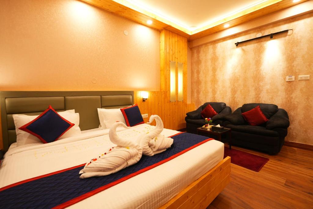 Postel nebo postele na pokoji v ubytování Zip By Spree Hotels Bella Heights Mcleodganj