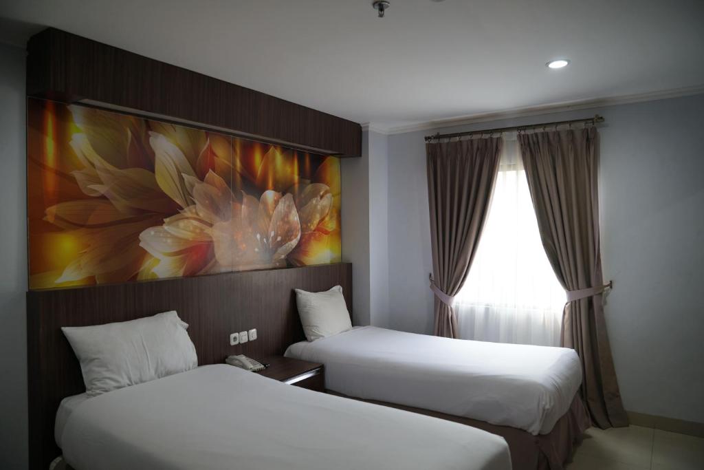 Postel nebo postele na pokoji v ubytování D'Arcici Hotel Sunter