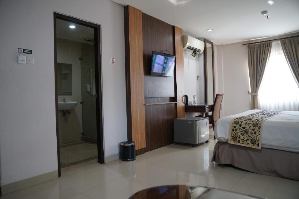 Postel nebo postele na pokoji v ubytování D'Arcici Hotel Sunter