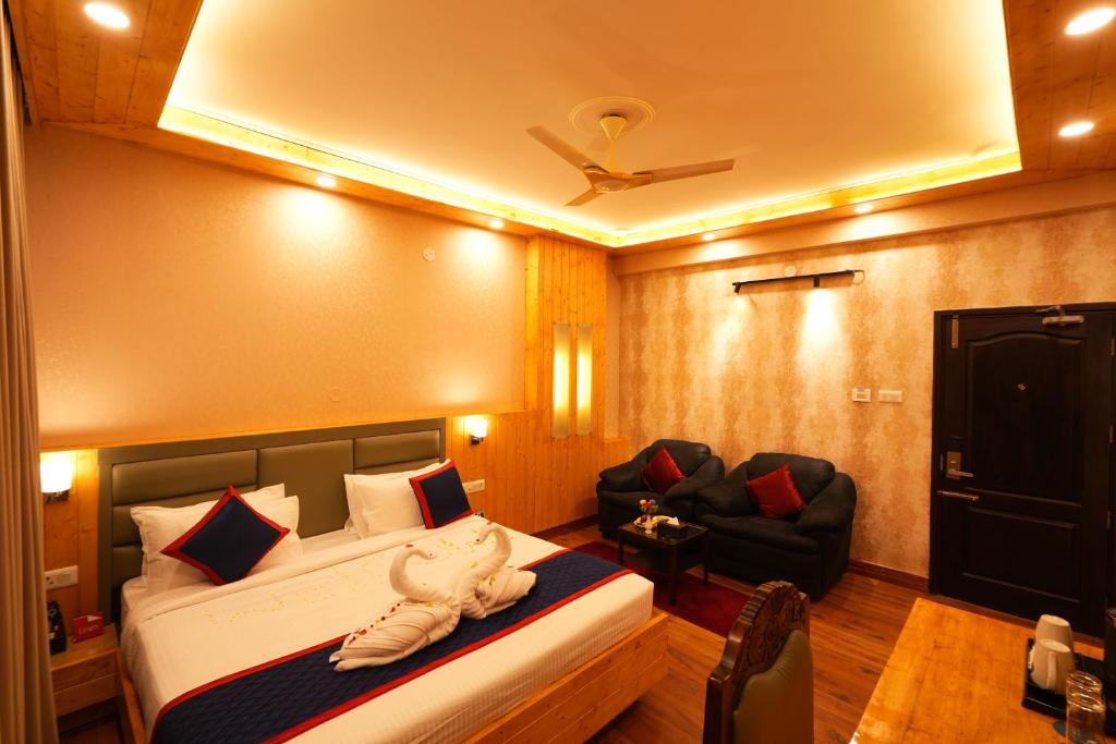 Postel nebo postele na pokoji v ubytování Zip By Spree Hotels Bella Heights Mcleodganj
