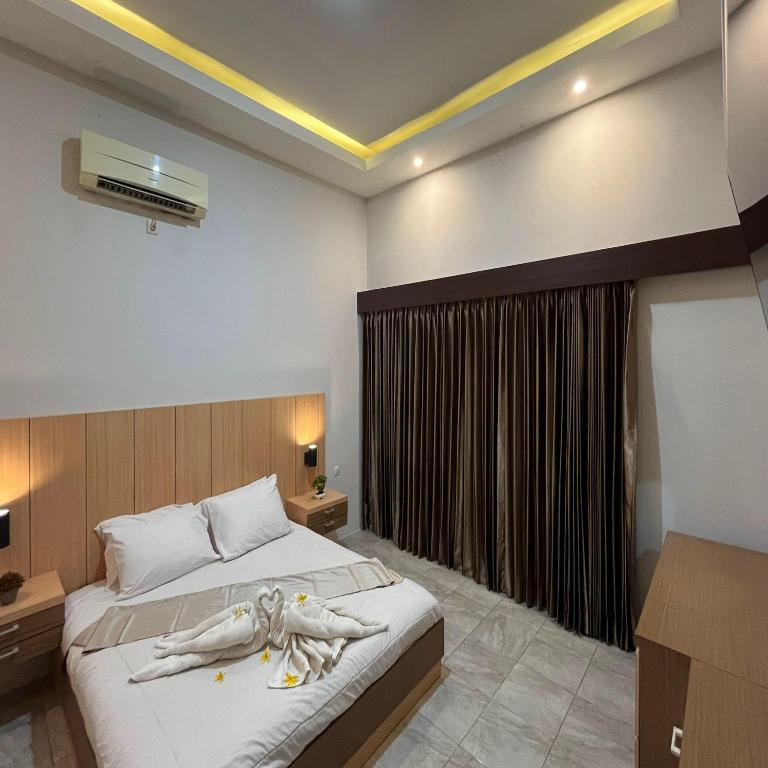 Wonorejo Hotel Mitra RedDoorz - Suite Ejecutiva