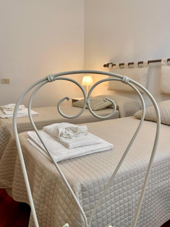 Letto o letti in una camera di Palazzo Antico
