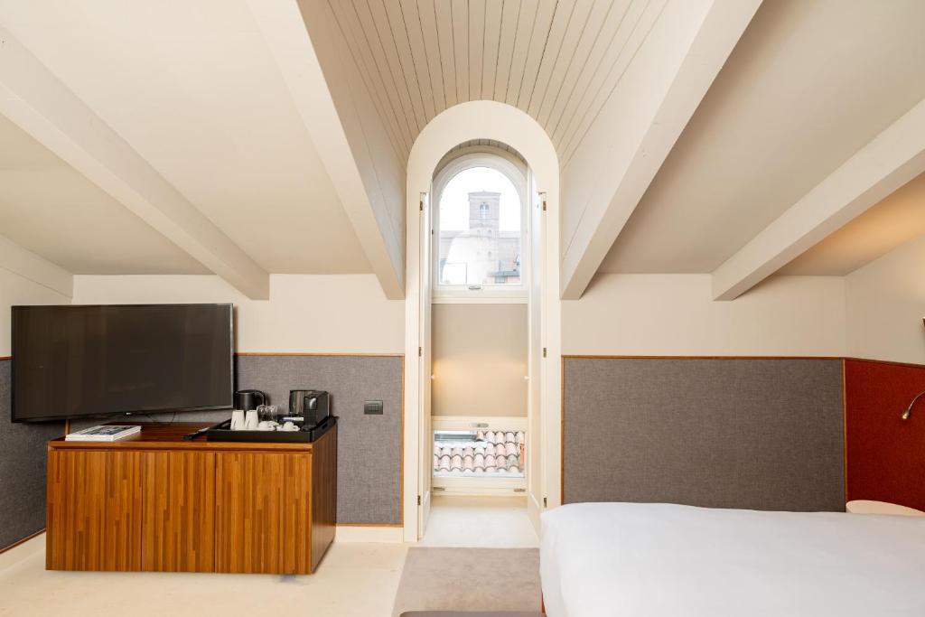 TV a/nebo společenská místnost v ubytování Hotel Brun