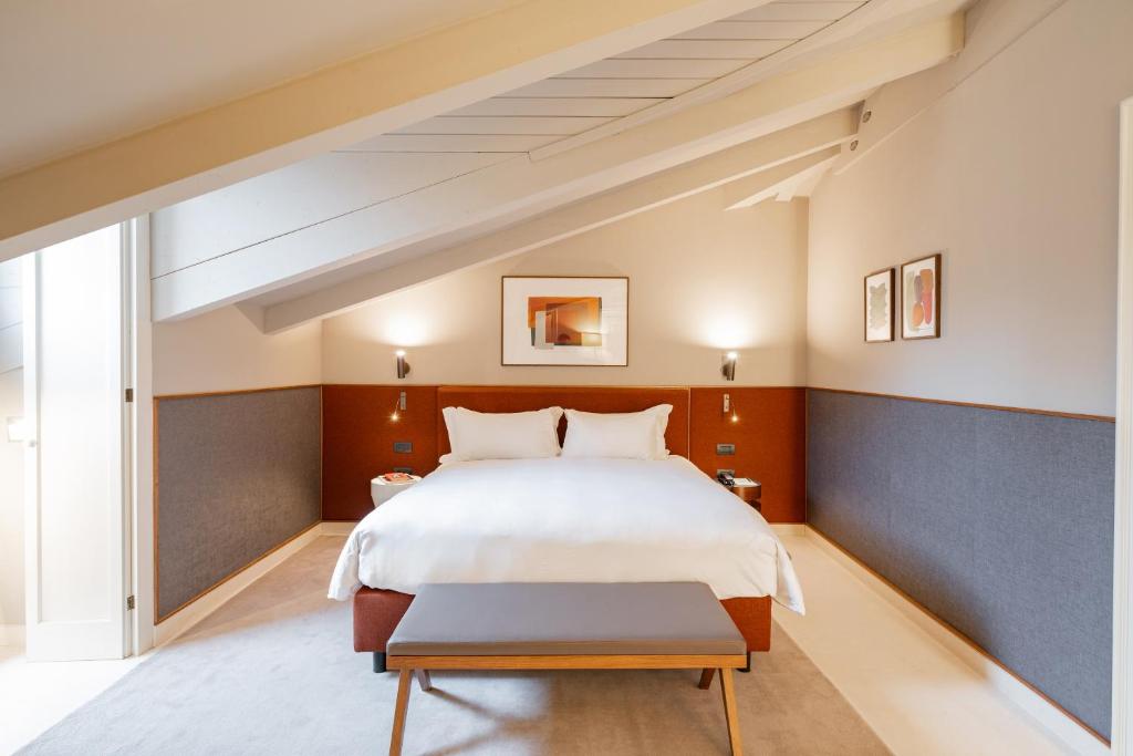 Postel nebo postele na pokoji v ubytování Hotel Brun
