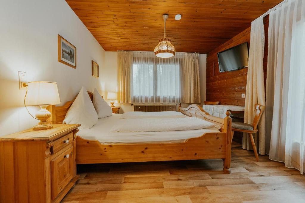 Postel nebo postele na pokoji v ubytování Zudrellhus