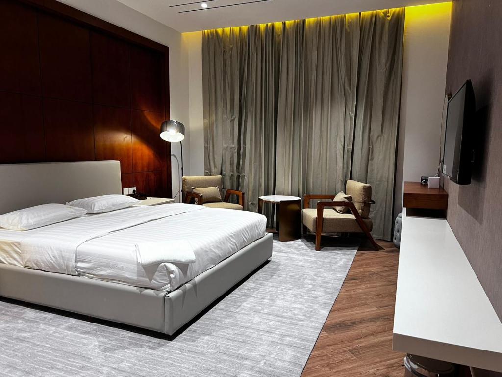 Postel nebo postele na pokoji v ubytování فندق الياس - Yas Hotel