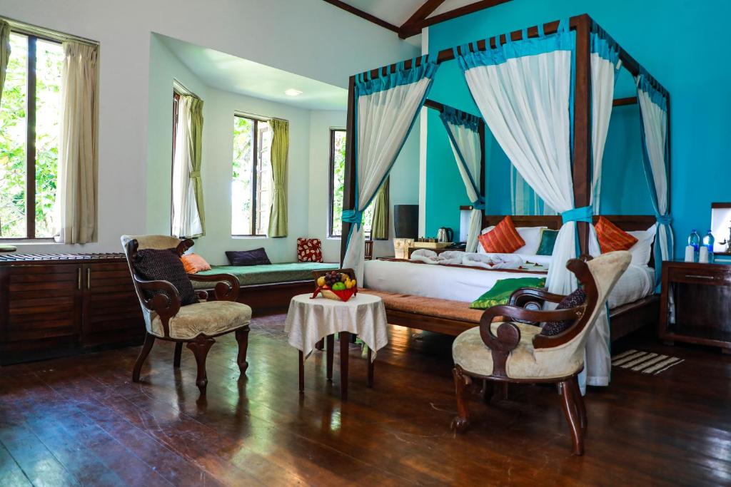 Posezení v ubytování Old Lighthouse Bristow Hotel , Fort Kochi
