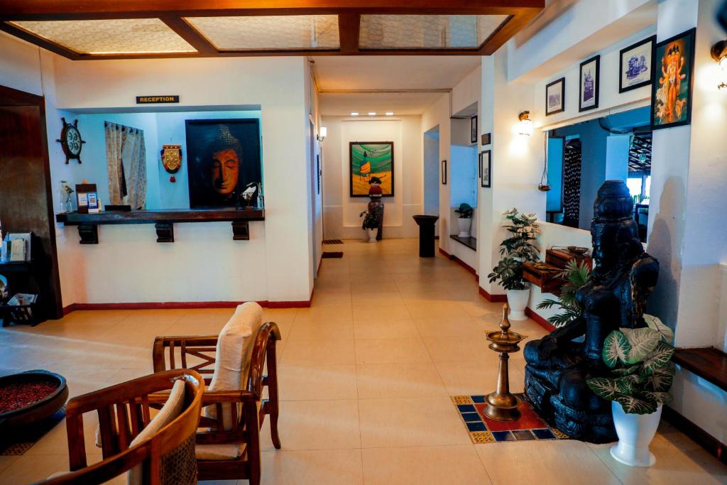 Posezení v ubytování Old Lighthouse Bristow Hotel , Fort Kochi