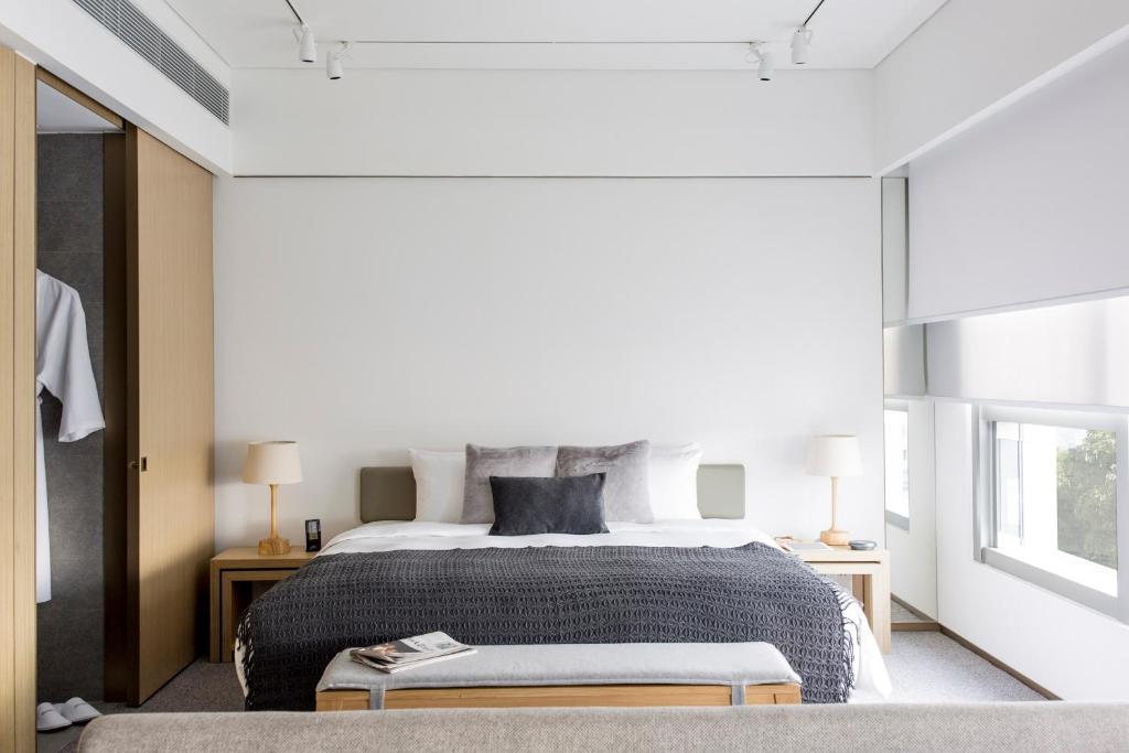 Postel nebo postele na pokoji v ubytování Hotel Stage