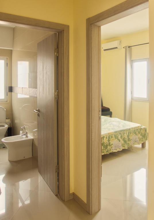 Koupelna v ubytování Praia Capital Residence Aparthotel