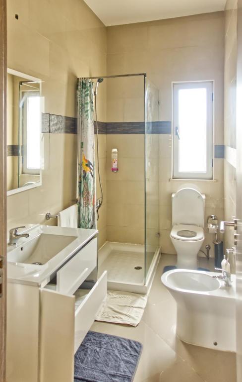 Koupelna v ubytování Praia Capital Residence Aparthotel