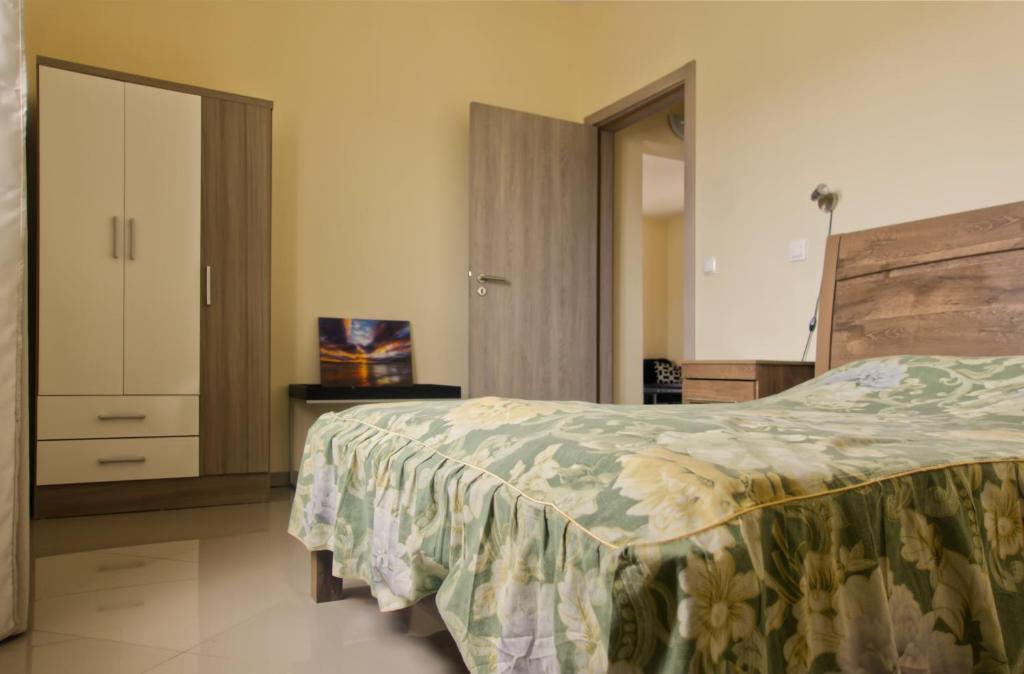 Postel nebo postele na pokoji v ubytování Praia Capital Residence Aparthotel