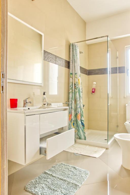 Koupelna v ubytování Praia Capital Residence Aparthotel