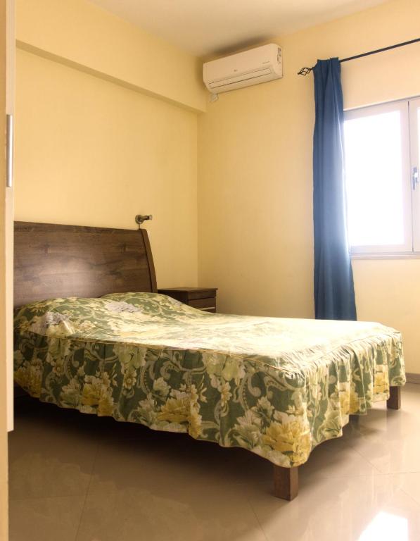 Postel nebo postele na pokoji v ubytování Praia Capital Residence Aparthotel