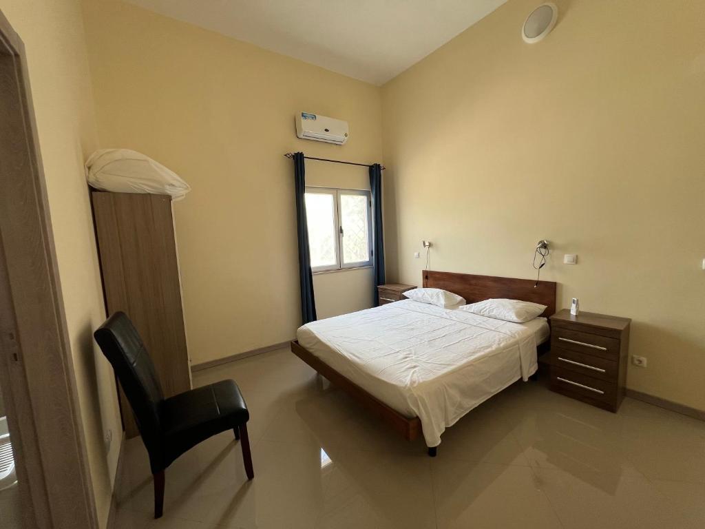 Postel nebo postele na pokoji v ubytování Praia Capital Residence Aparthotel