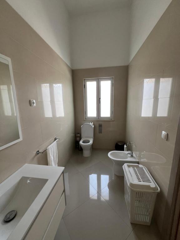 Koupelna v ubytování Praia Capital Residence Aparthotel