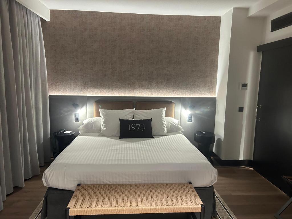 Postel nebo postele na pokoji v ubytování Hotel Dimar