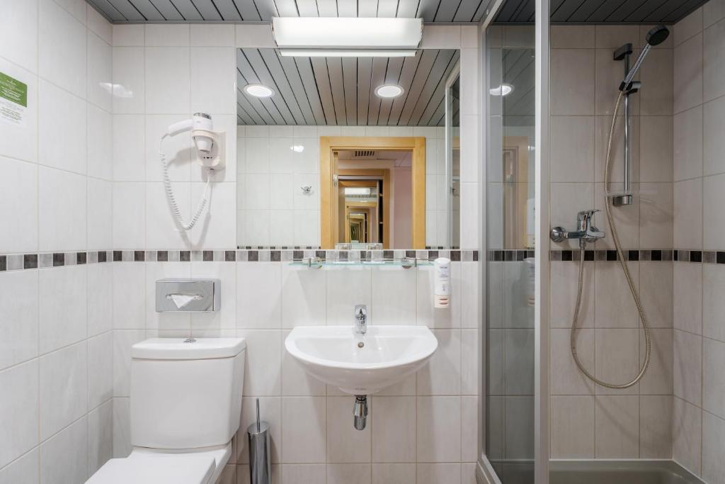 Koupelna v ubytování Riga Islande Hotel with FREE Parking