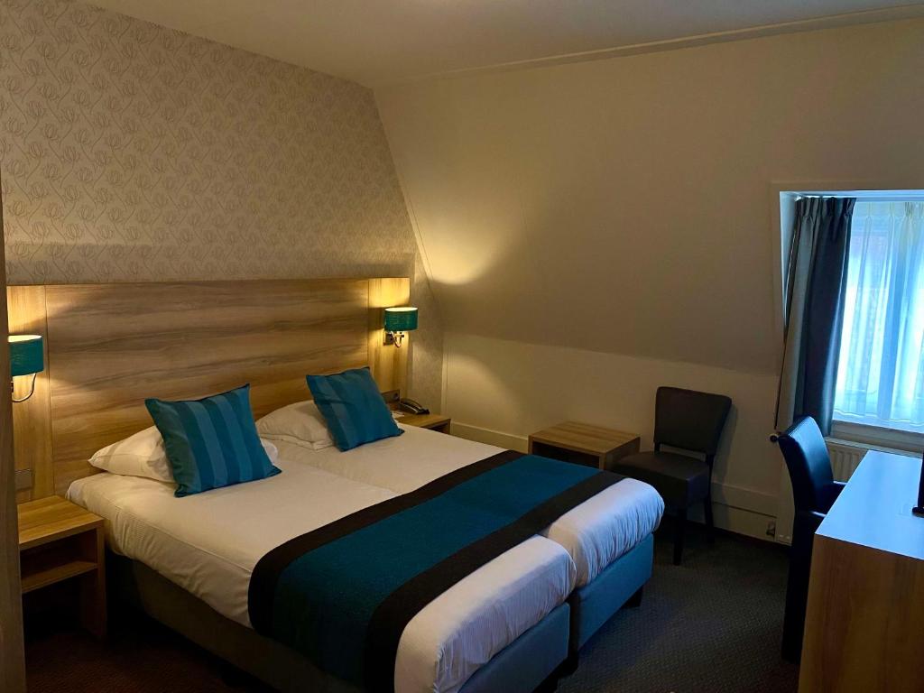 Postel nebo postele na pokoji v ubytování Best Western Hotel Baars