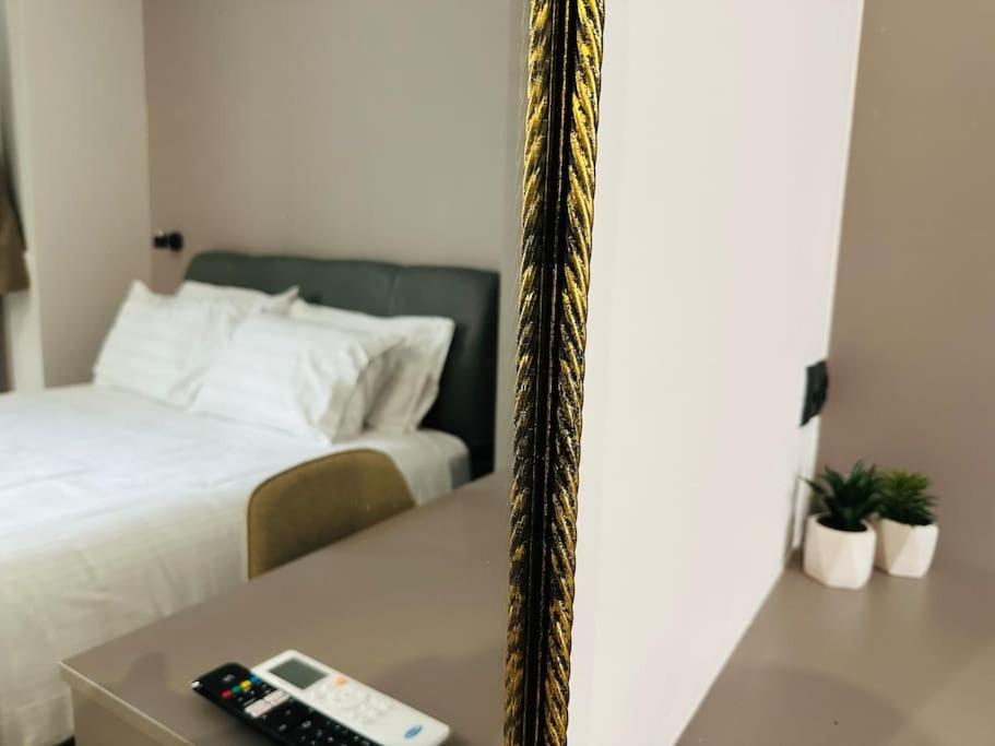 Postel nebo postele na pokoji v ubytování Port Brown Suite 1