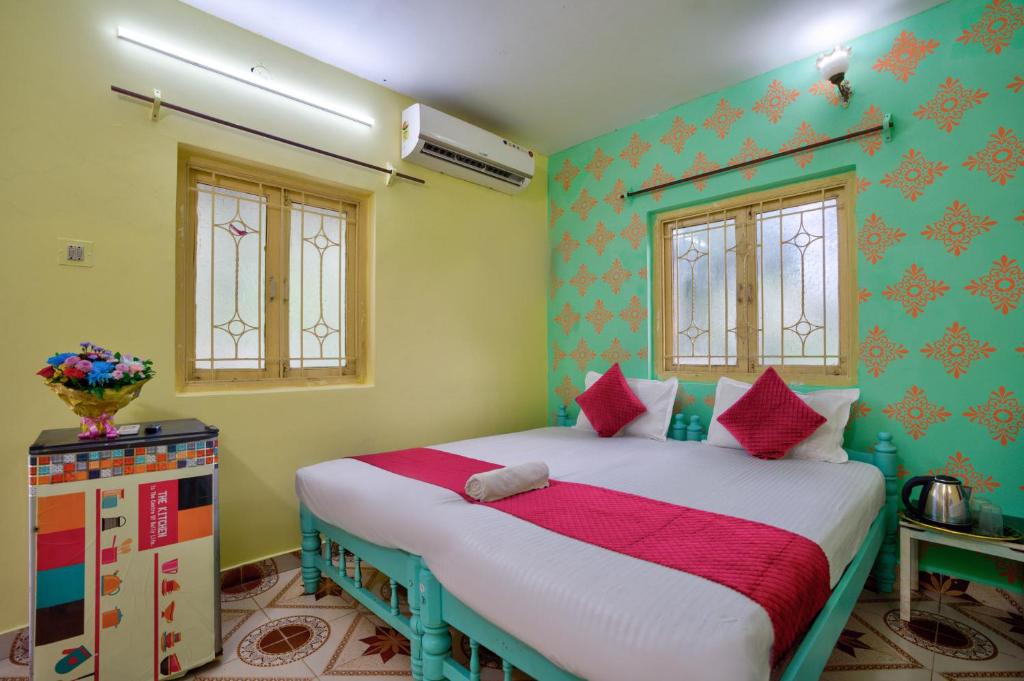 Postel nebo postele na pokoji v ubytování Oceanic Pearl Beach Guest House