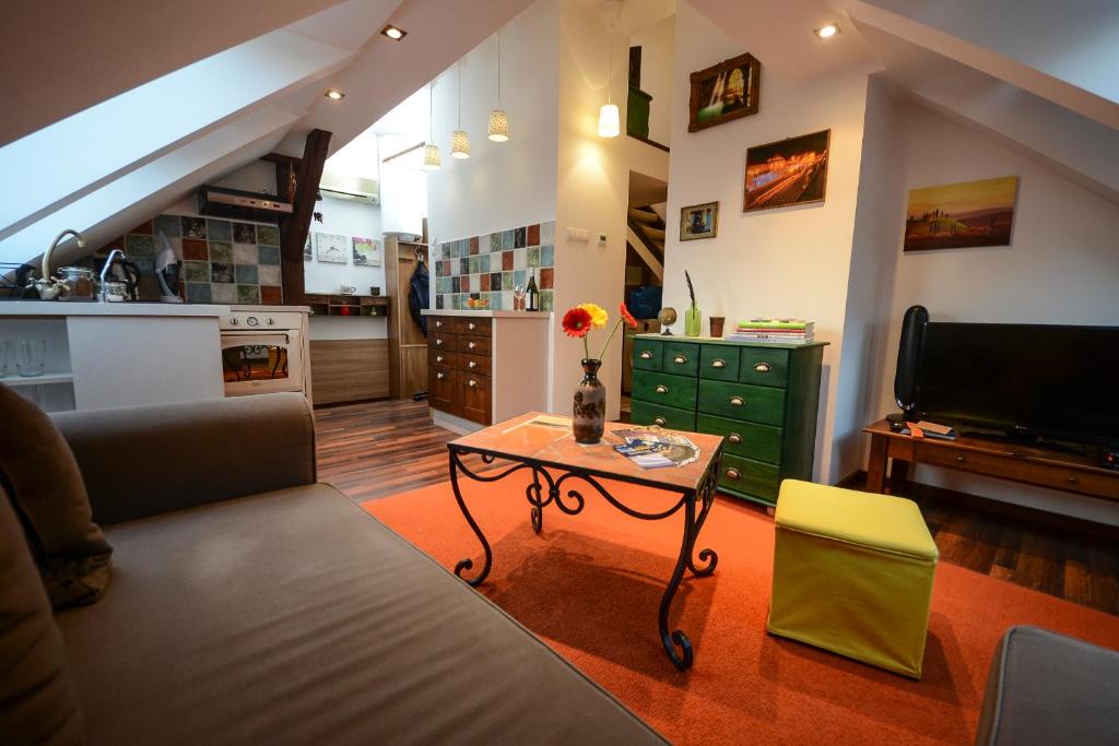 Televízia a/alebo spoločenská miestnosť v ubytovaní St. Gellért Square - Minilux Apartman