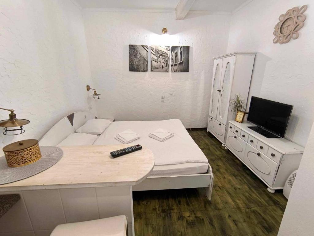 Postel nebo postele na pokoji v ubytování FLH - Chic Studio in Old Town