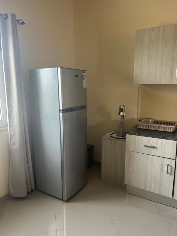Kuchyň nebo kuchyňský kout v ubytování Praia Capital Residence Aparthotel