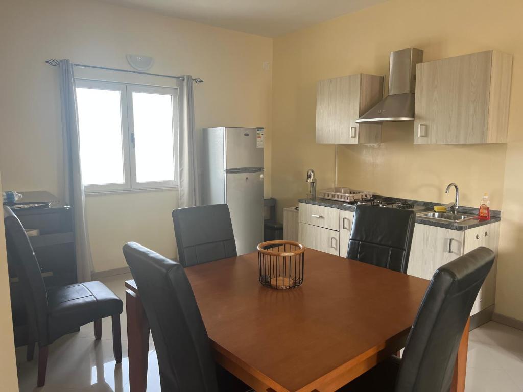 Kuchyň nebo kuchyňský kout v ubytování Praia Capital Residence Aparthotel