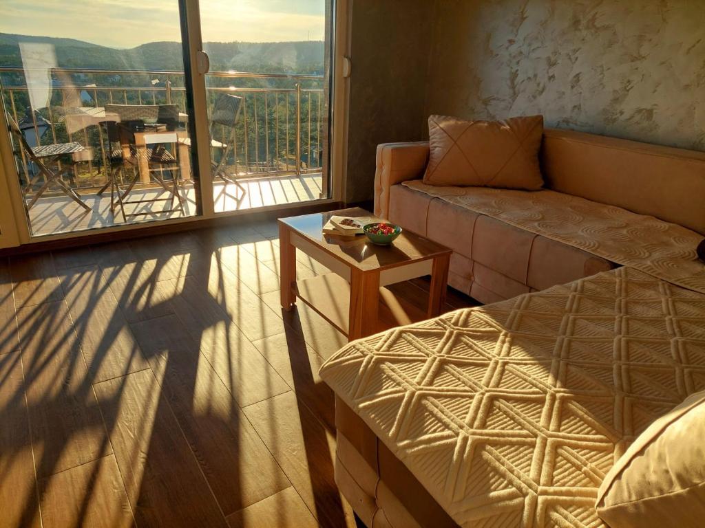 Posezení v ubytování Apartmani DIVČI Tron 9