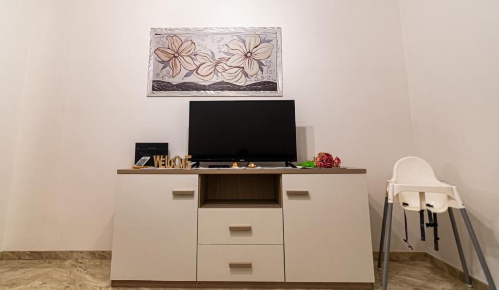 TV a/nebo společenská místnost v ubytování Casa D'Amico