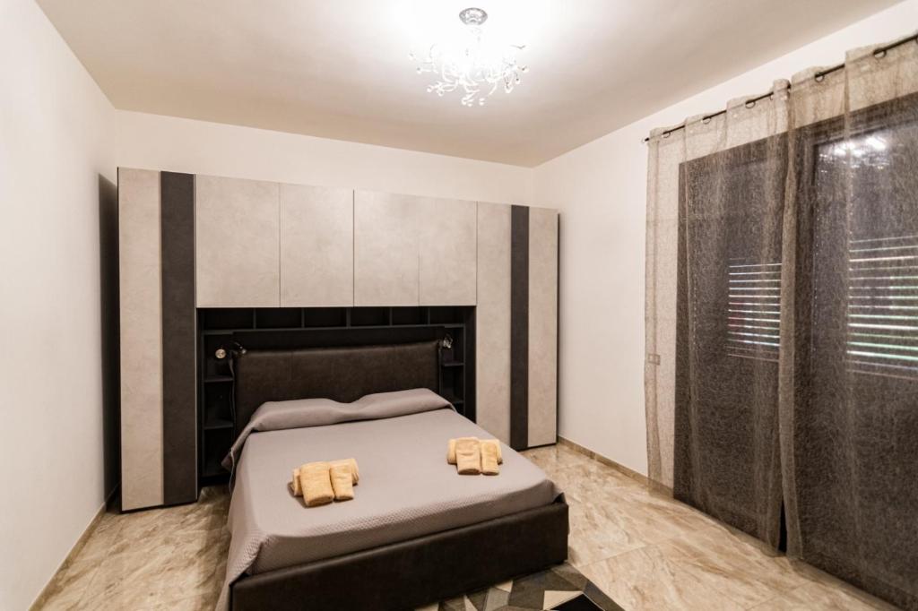 Postel nebo postele na pokoji v ubytování Casa D'Amico