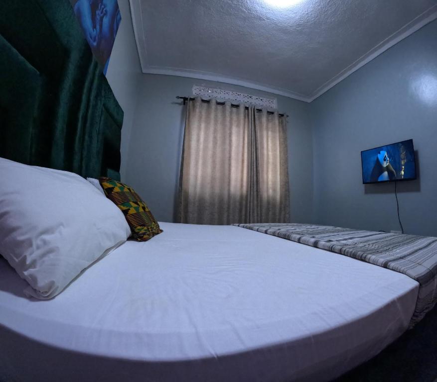 Postel nebo postele na pokoji v ubytování Daddy's