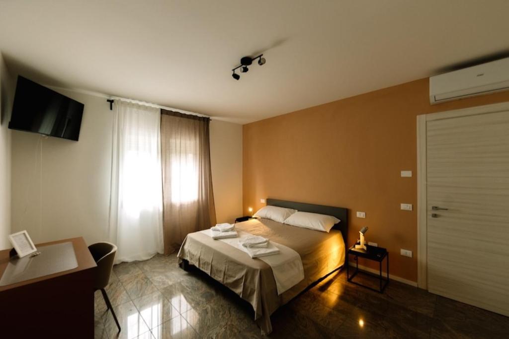 Postel nebo postele na pokoji v ubytování Martina’s Rooms