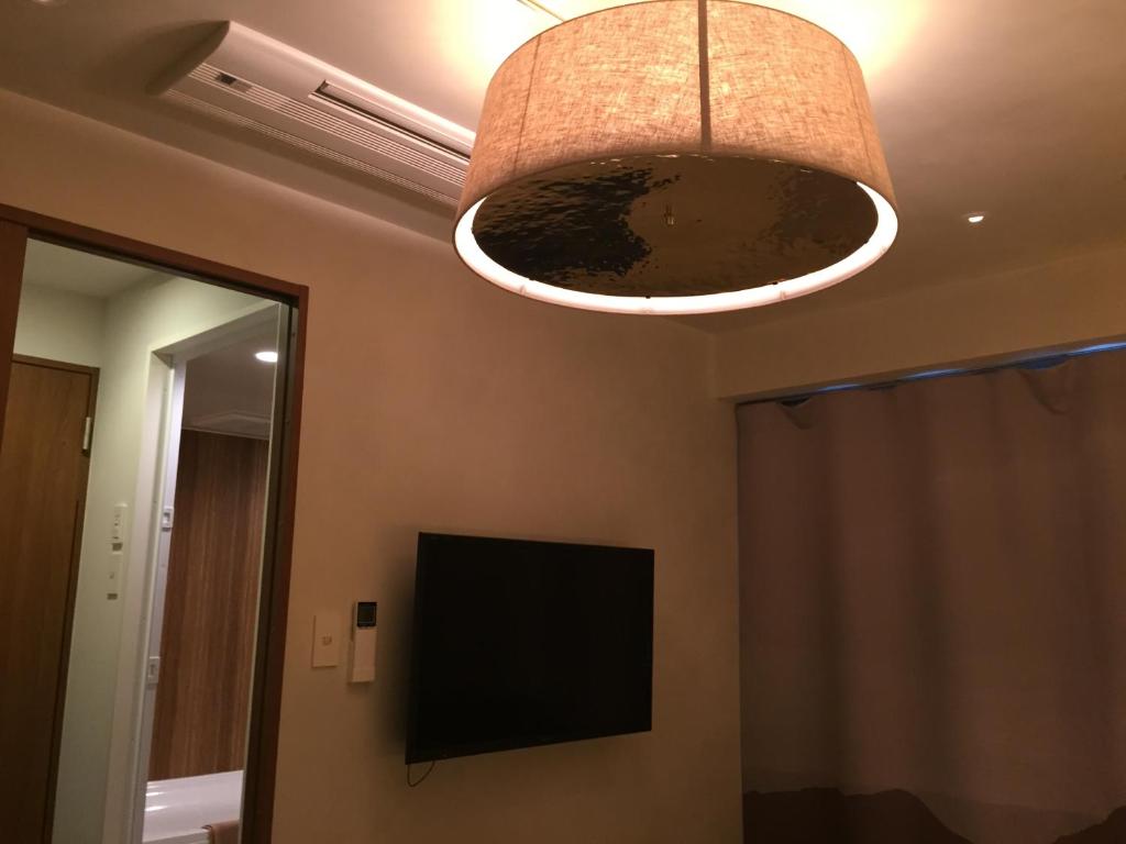 TV a/nebo společenská místnost v ubytování The Wall Hotel