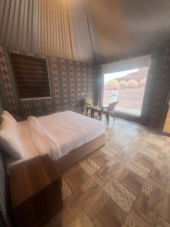 Voodi või voodid majutusasutuse Lulua luxury camp toas