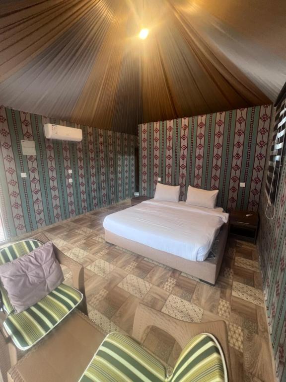 Voodi või voodid majutusasutuse Lulua luxury camp toas