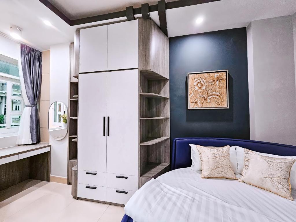 Ένα ή περισσότερα κρεβάτια σε δωμάτιο στο APEC BnB Hotel