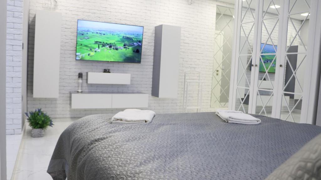 Postel nebo postele na pokoji v ubytování Small Lux Apartment
