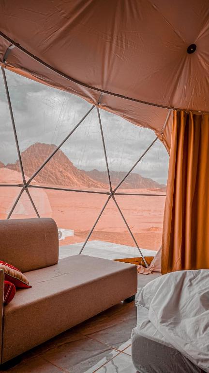 Voodi või voodid majutusasutuse Lulua luxury camp toas
