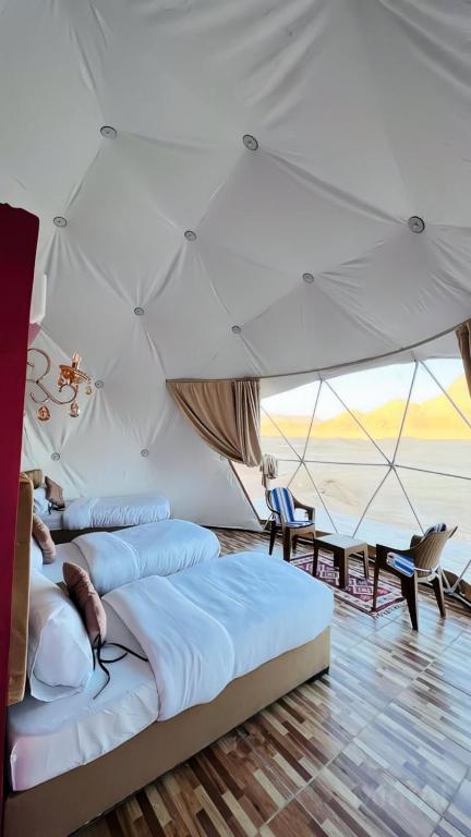 Voodi või voodid majutusasutuse Lulua luxury camp toas