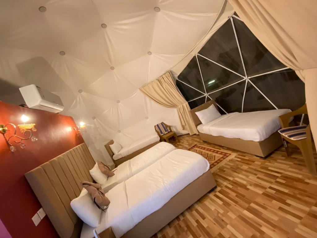 Voodi või voodid majutusasutuse Lulua luxury camp toas