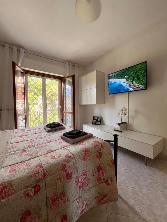 A television and/or entertainment centre at Appartamento “BellaVista” a Norma