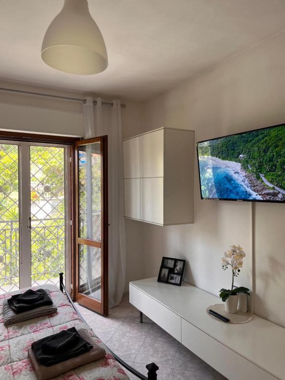 A television and/or entertainment centre at Appartamento “BellaVista” a Norma