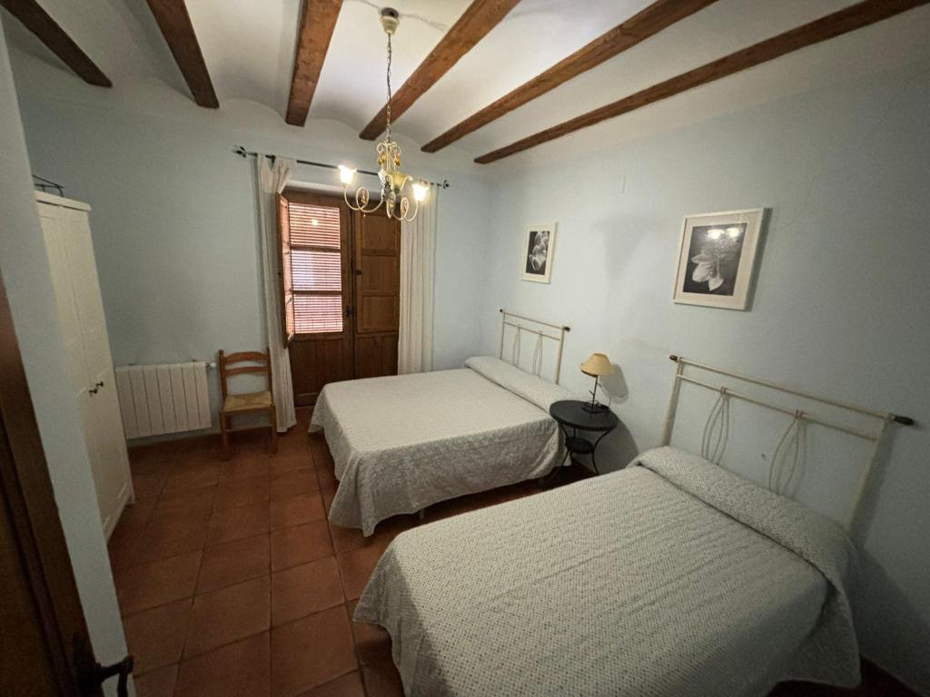 Postel nebo postele na pokoji v ubytování Casa Rural Carcelen