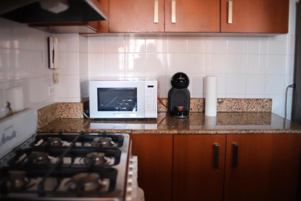Kuchyň nebo kuchyňský kout v ubytování Oasis Hotel