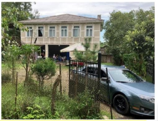 a car parked in front of a house at House Gio - Birdwatching in Sakhalvasho
