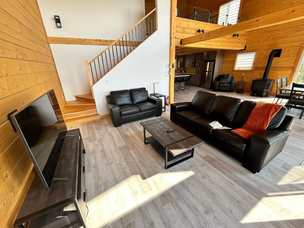 Posezení v ubytování Chalets domaine Otis