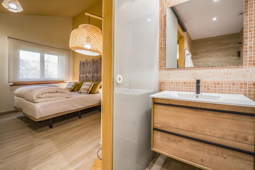 Postel nebo postele na pokoji v ubytování Pleta de Soldeu Lodge